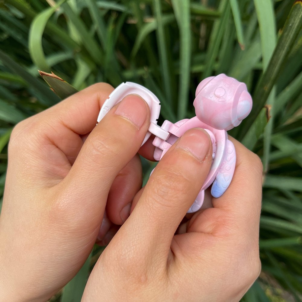 Close up of the Calm Buddi Turtle, a textured sensory fidget tool used as a safe alternative to skin picking and nail biting.