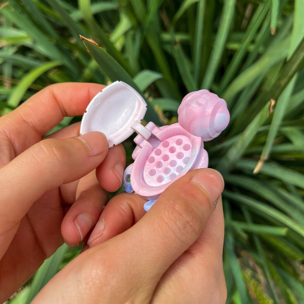 Close up of the Calm Buddi Turtle, a textured sensory fidget tool used as a safe alternative to skin picking and nail biting.